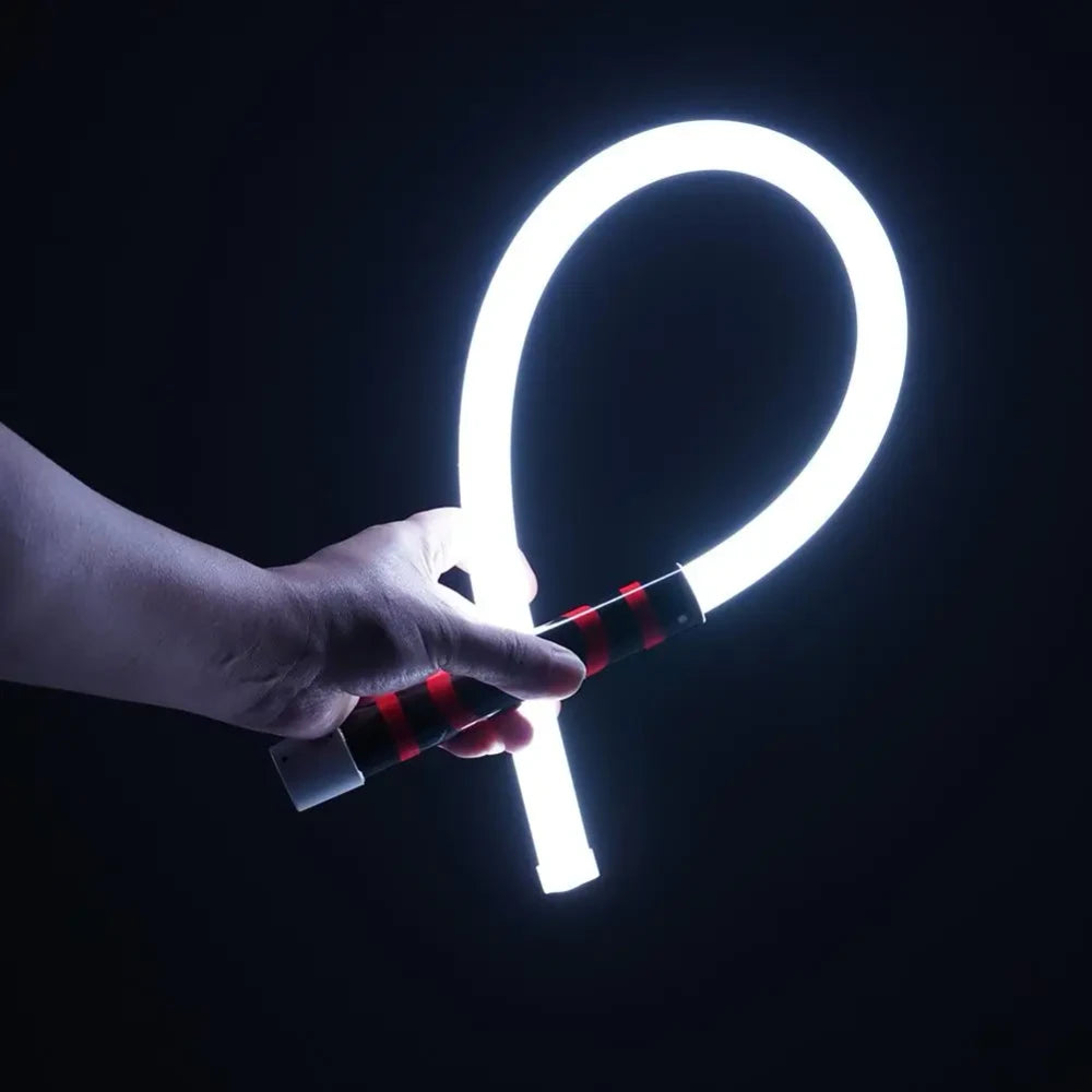 FlexBeam bent into a loop and glowing in a hand